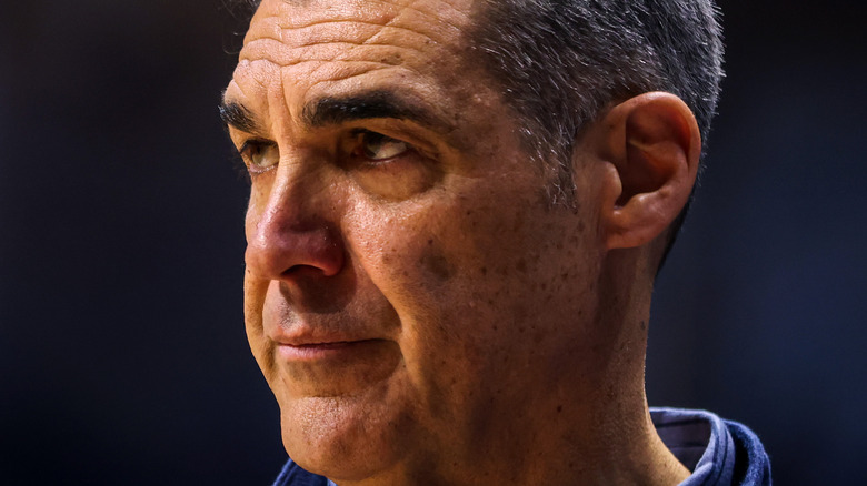 Jay Wright looking at the court