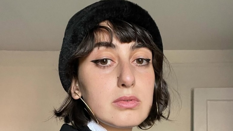 Rama Duwaji posing in a hat