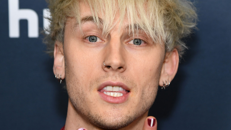 Machine Gun Kelly with mouth open