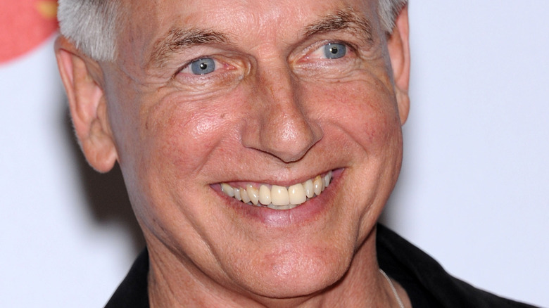 Mark Harmon looking to the side with wide smile