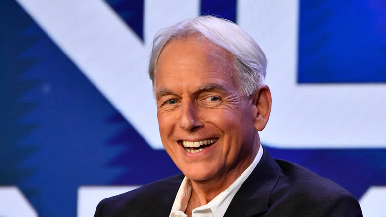Mark Harmon looking to the side with wide smile