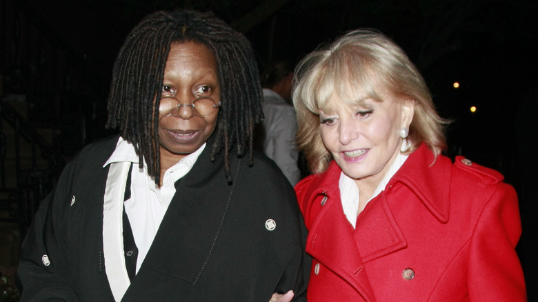 Whoopi Goldberg and Barbara Walters walking 