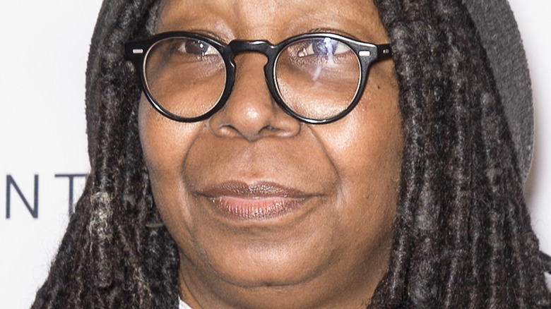 Whoopi Goldberg wears glasses on the red carpet