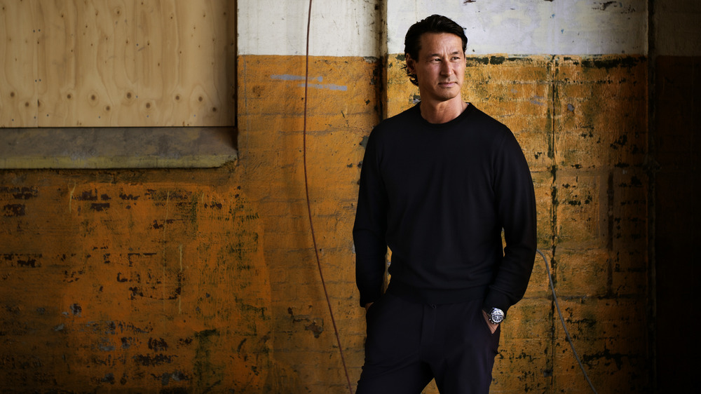 Toni Petersson standing with hands in pockets