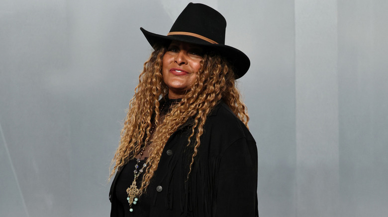 Pam Grier wearing a black cowboy hat and matching jacket at the 2026 Vanity Fair Oscars Party.