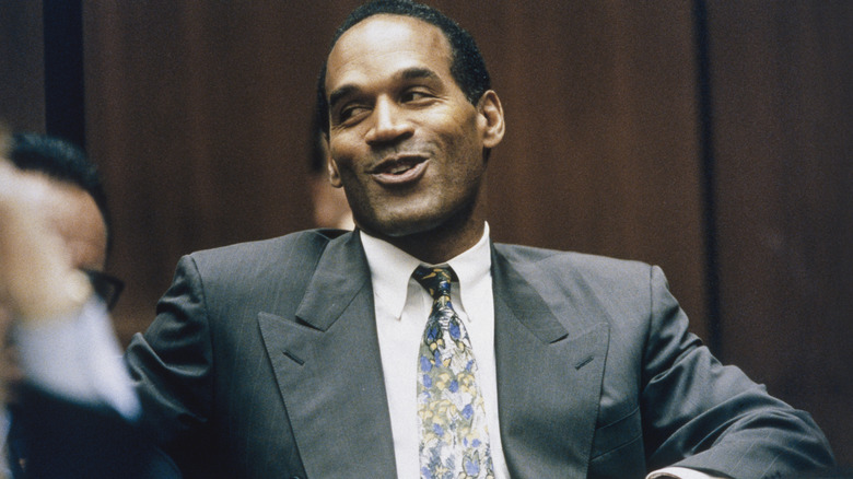 O.J. Simpson smiling in court