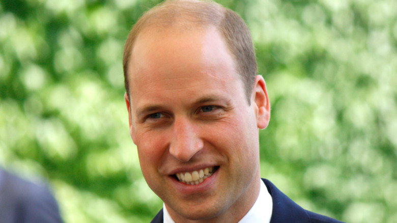 Prince William standing outside