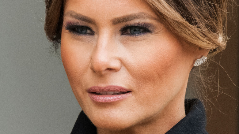 Melania Trump looks into a camera