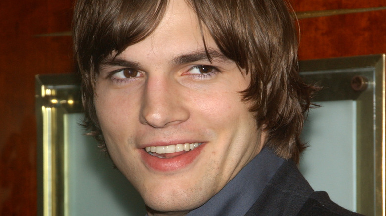 Ashton Kutcher smiles at Hollywood event