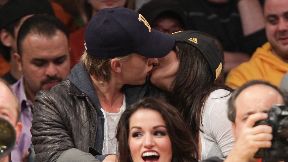 Austin Butler and Vanessa Hudgens making out at a basketball game