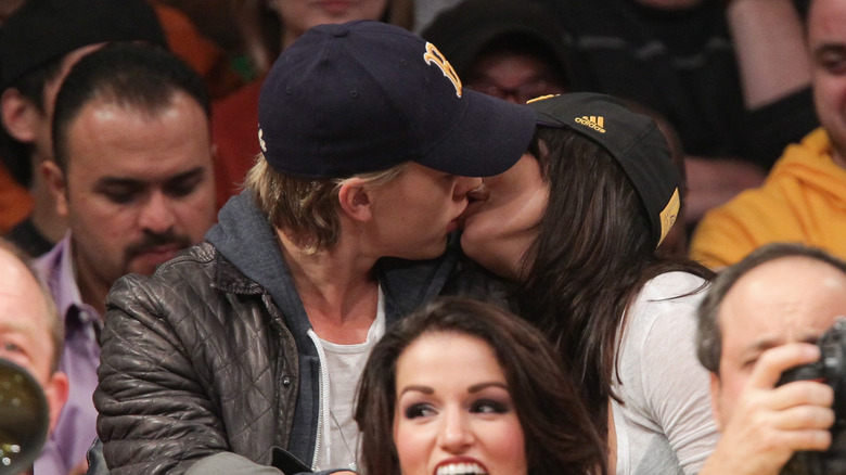 Austin Butler and Vanessa Hudgens making out at a basketball game