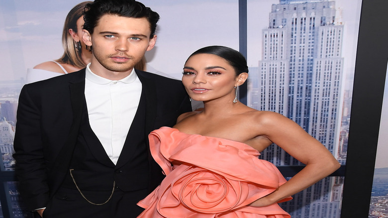 AUstin Butler and Vanessa Hudgens posing for pictures