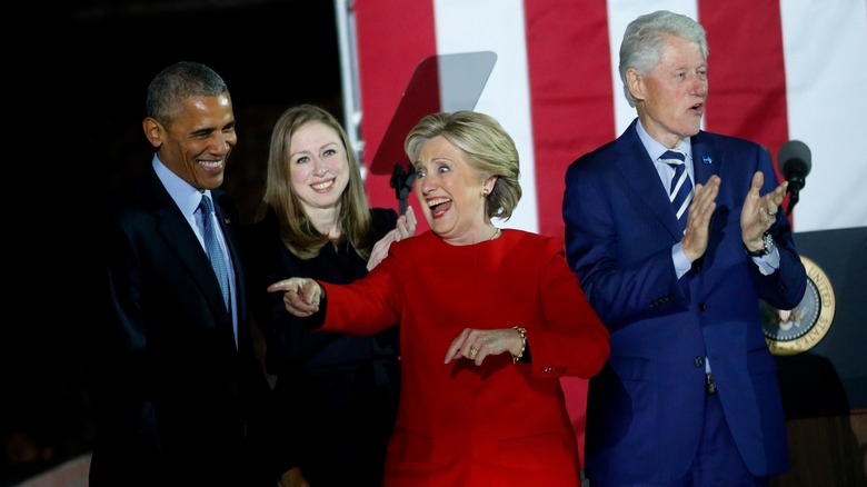 Barack Obama, Chelsea Clinton, Hillary Clinton, Bill Clinton attending rally