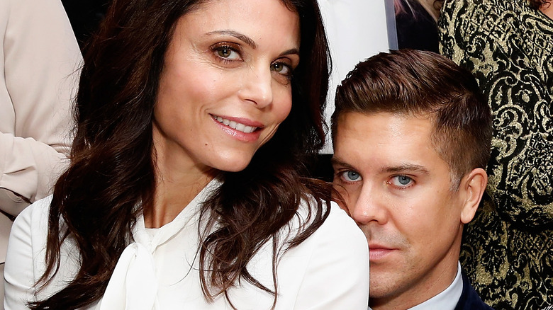 Bethenny Frankel sits on Fredrik Eklund's lap