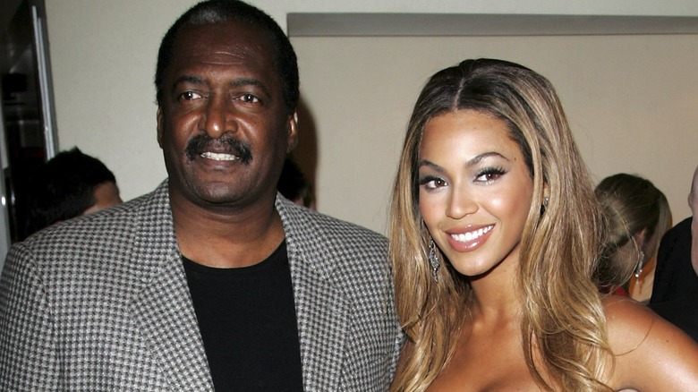Matthew Knowles and Beyoncé smiling