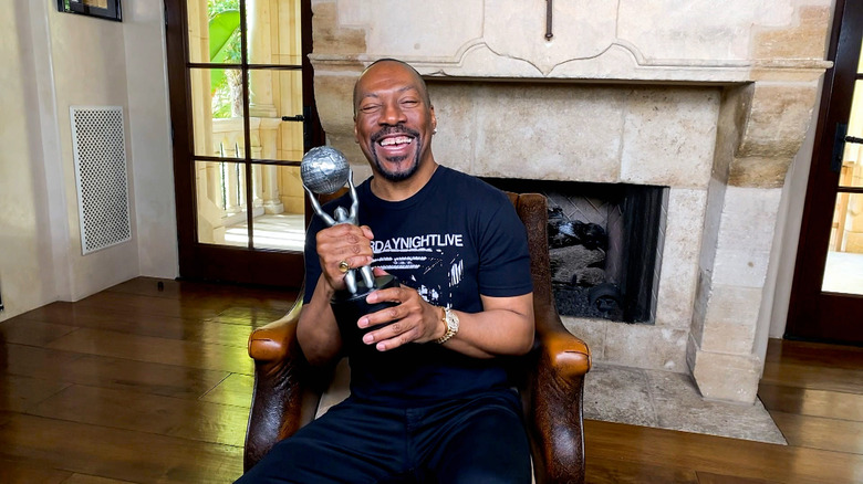 Eddie Murphy at home with his NAACP Award