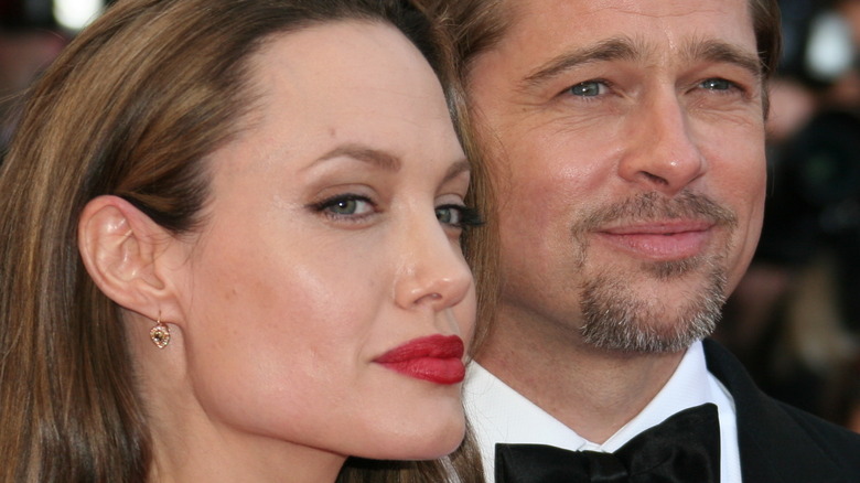 Angelina Jolie and Brad Pitt smiling