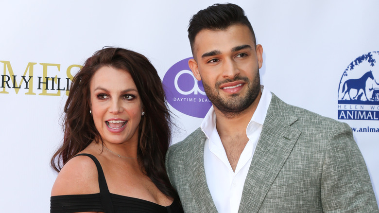 Britney Spears and Sam Asghari smiling