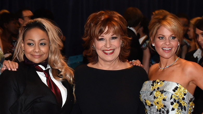 Raven-Symone, Joy Behar, and Candace Cameron Bure posing