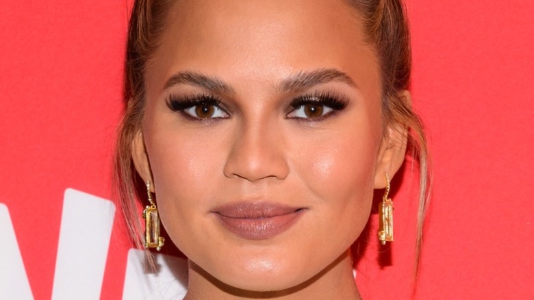 Chrissy Teigen smile lipstick 