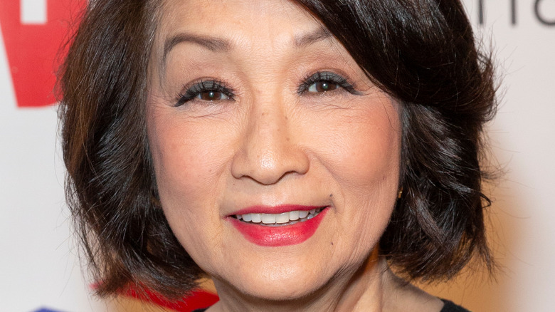 Connie Chung smiles and poses at a 2019 awards ceremony