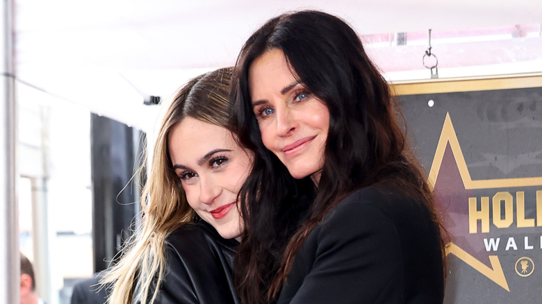 Courtney Cox hugs her daughter Coco