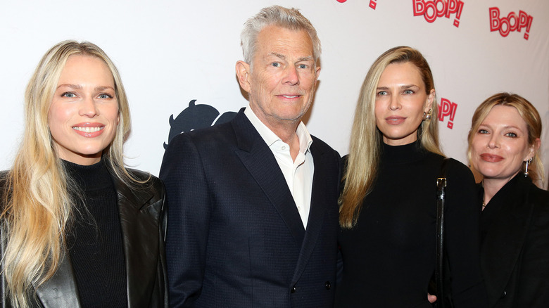 David Foster posing with daughters Amy, Erin, and Sara