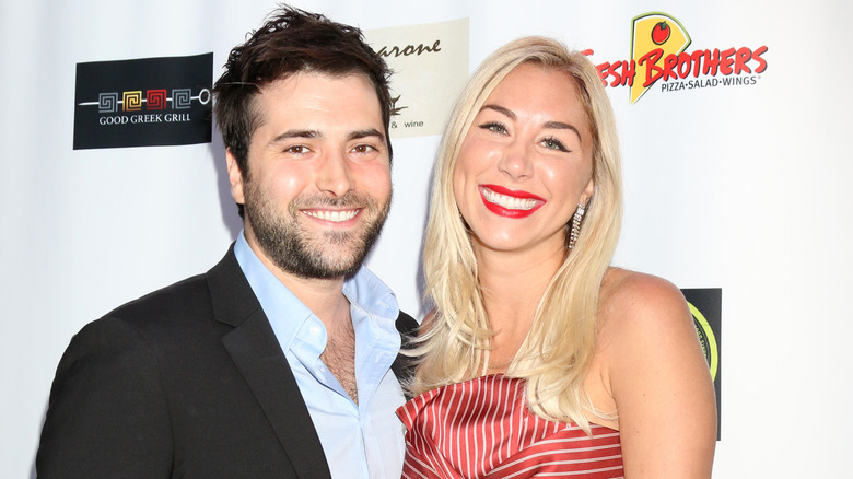 Freddie Smith and his wife pose for a photo.