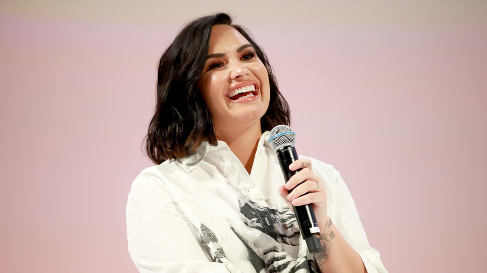 Demi Lovato speaking at Teen Vogue Summit 2019