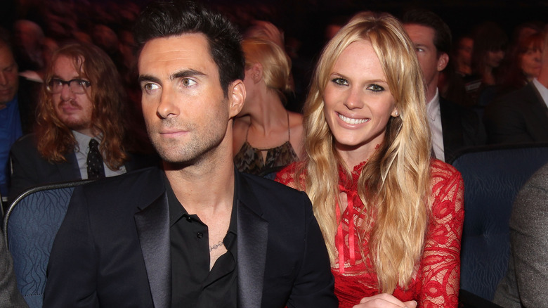 Adam Levine and Anne V smiling
