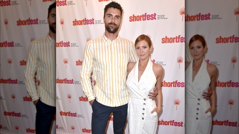 Brittany Snow and Tyler Stanaland posing