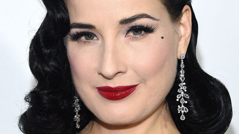 Dita von Teese wears red lipstick 