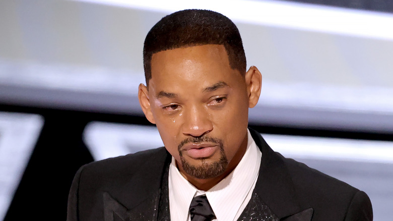 Will Smith accepting the Actor in a Leading Role award for 'King Richard' onstage during the 94th Annual Academy Awards