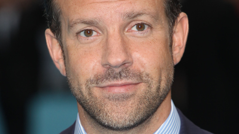 Jason Sudeikis smiles at the camera