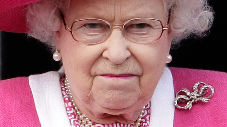 Queen Elizabeth II grimacing