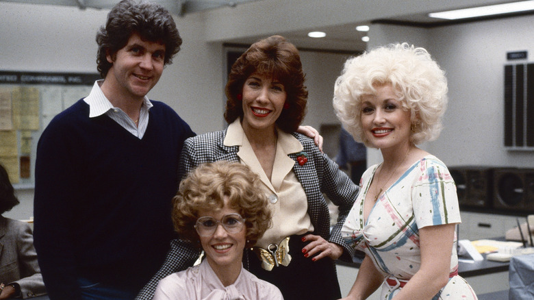 Colin Higgins, Jane Fonda, Lily Tomlin and Dolly Parton on the set of '9 to 5.'