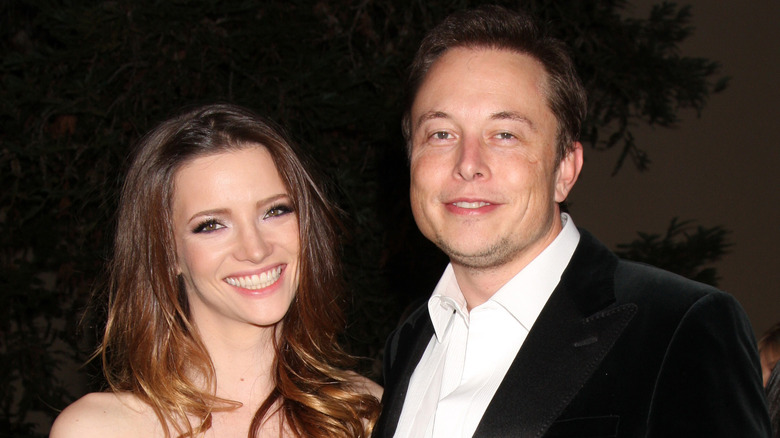 Talulah Riley smiling with Elon Musk