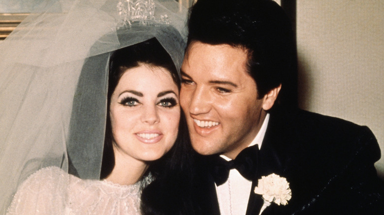 Priscilla and Elvis Presley at their wedding