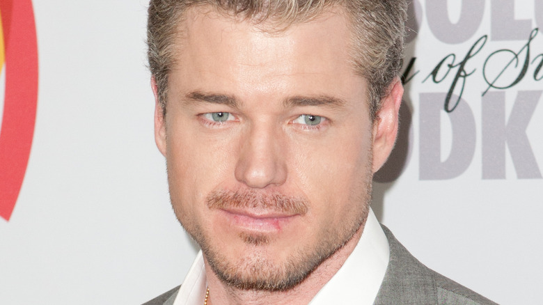 Eric Dane smiles on the red carpet