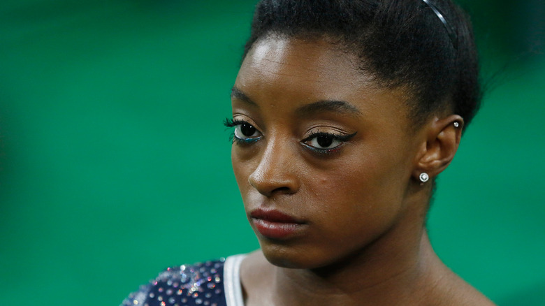 Simone Biles with serious expression during competition