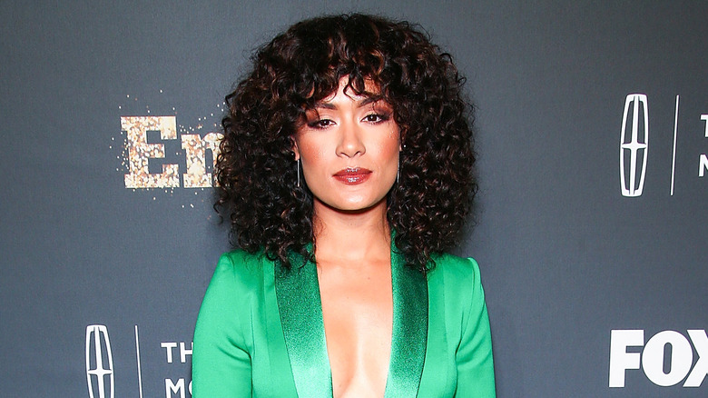 Grace Byers posing at an event