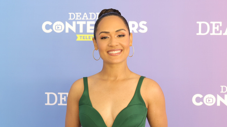 Grace Byers posing at an event