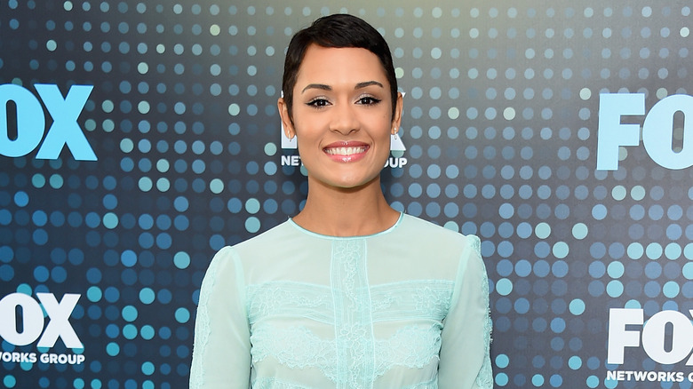 Grace Byers posing at an event