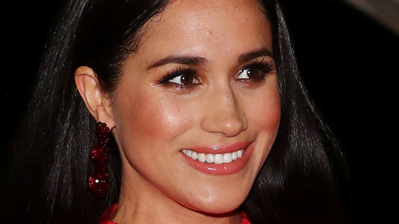 Meghan Markle wearing red earrings