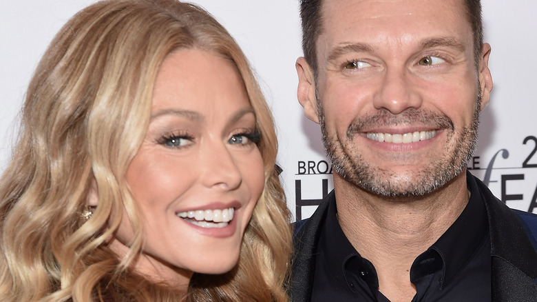 Kelly Ripa and Ryan Seacrest smiling