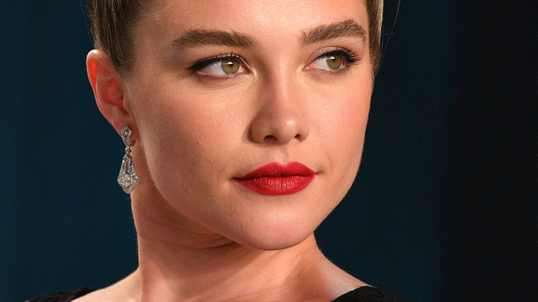 Florence Pugh posing at a film festival