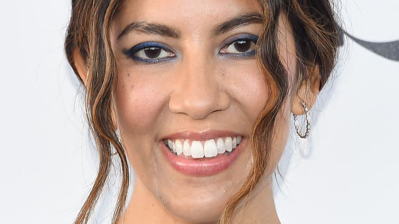 Stephanie Beatriz on red carpet 