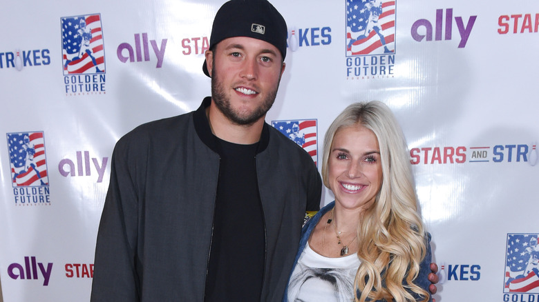 Matthew Stafford Kelly Stafford posing