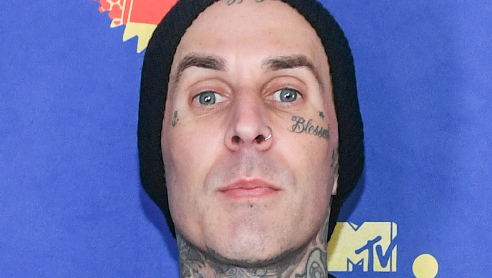 Travis Barker staring at camera