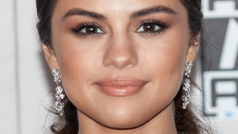 Selena Gomez wears diamond earrings